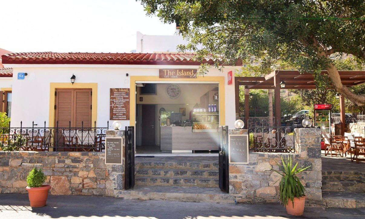 The Island café-snack — full view of the building and terrace